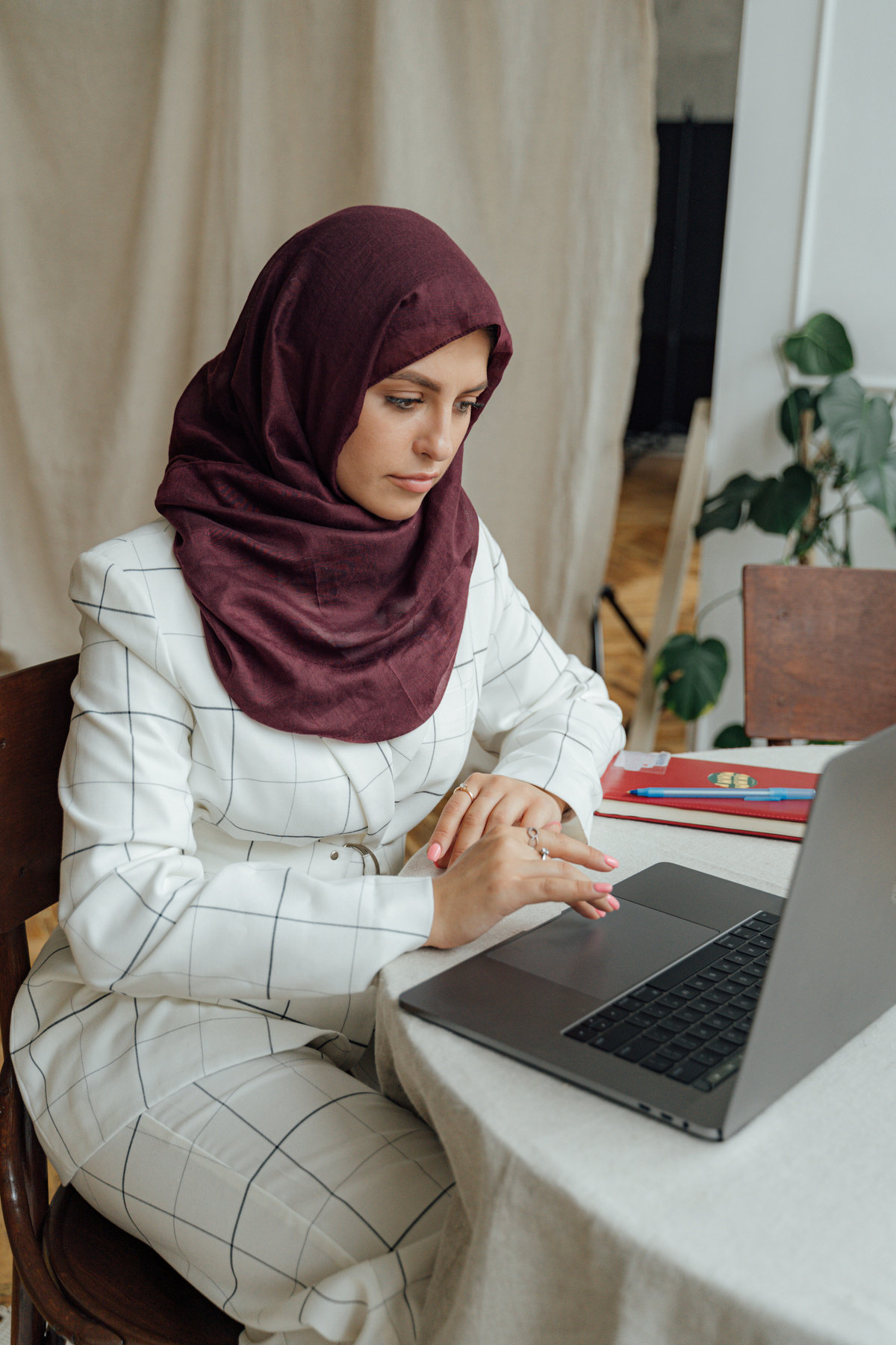 Muslim Woman Using Macbook